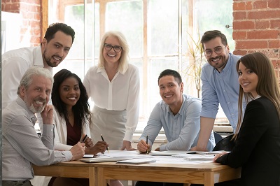 a group of people sitting at a table